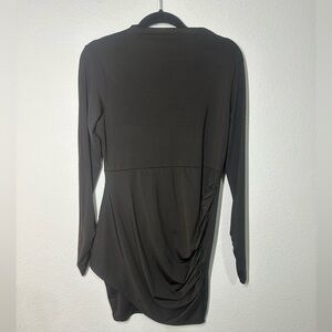 Black bodycon dress perfect for holiday parties and keeps you warm as well